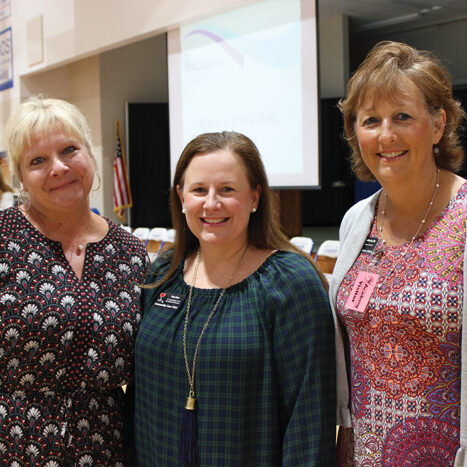 Submitted - Heather Coulter of Salisbury Academy, left, stands with Teen Aron and Krista Woolly of the Community Care Clinic of Rowan County after presenting a gift of $2,500 raised at the Bloom gala to the clinic.