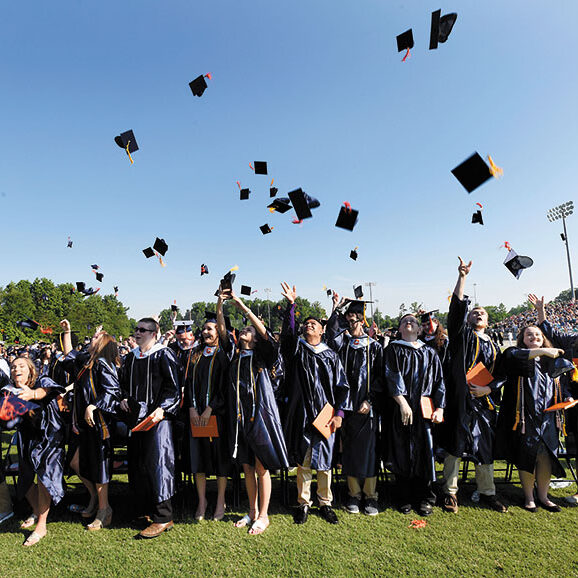 Graduation ceremony is over and the caps are  tossed into the air.  photo by Wayne Hinshaw, for the Salisbury Post